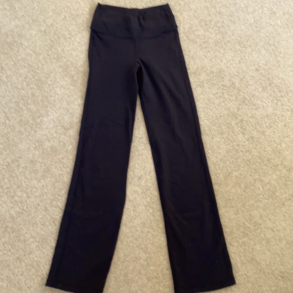 Lululemon black straight stretch pants. Size 4?